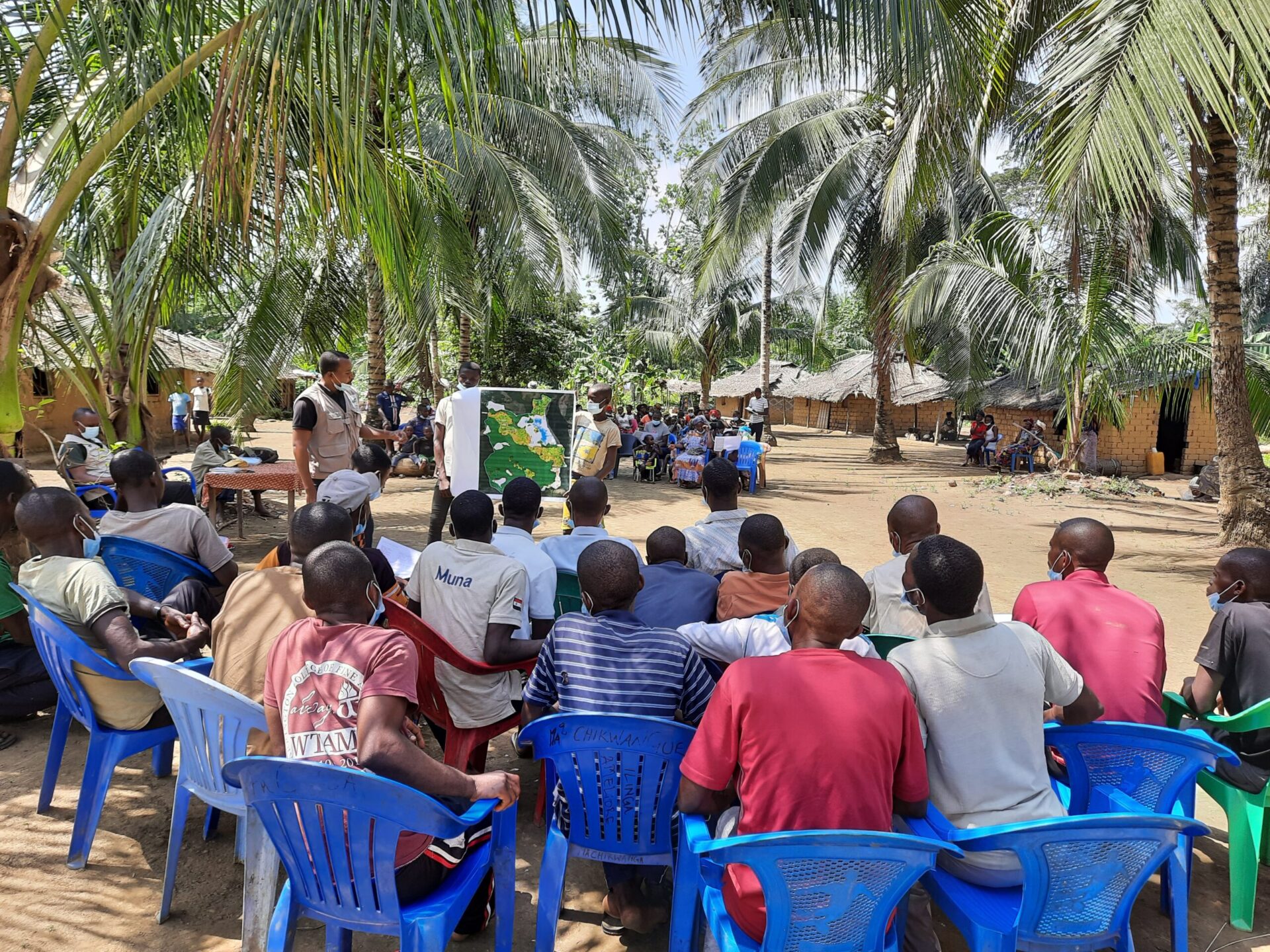 A community group discussing deforestation